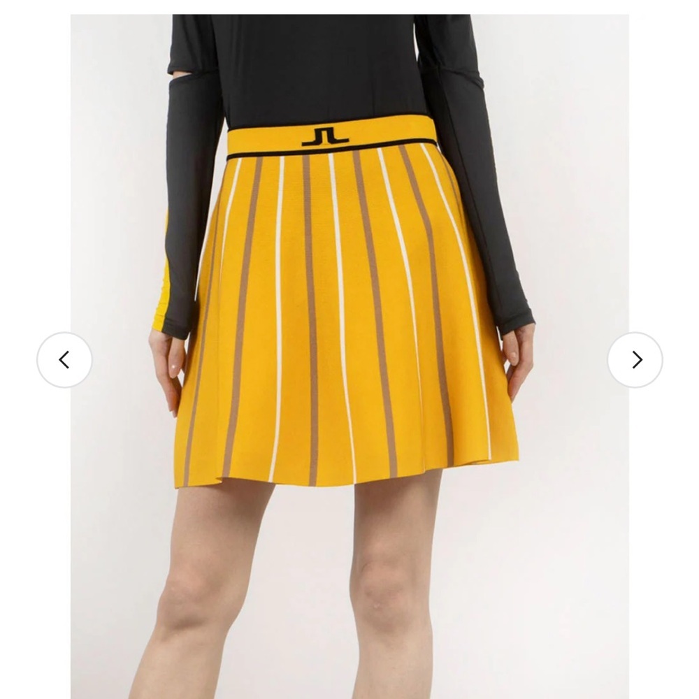 J. Lindeberg women’s River knitted golf skirt mustard yellow white tan stripe